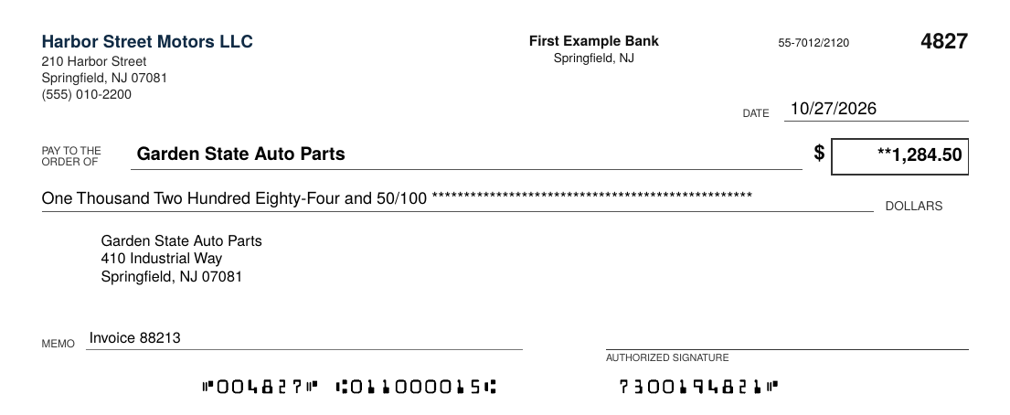 A check printed by CheckBridge on blank stock, showing company name, bank, payee, amount and MICR line